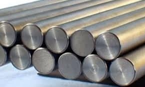 Stainless steel round bars with smooth finish stacked together for industrial and engineering applications.