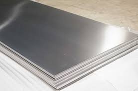 Flat stainless steel plates stacked with smooth surface finish for industrial and fabrication use.